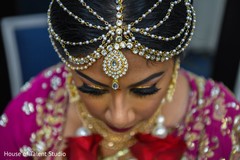 Indian bride wearing the tikka. Indian bride wearing the tikka.
