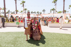 Lovely Indian couple walking out of the wedding ceremony. Lovely Indian couple walking out of the wedding ceremony.