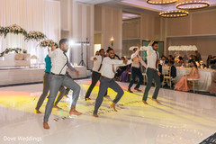 Groomsmen performing at reception party. Groomsmen performing at reception party.