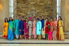 Adorable indian couple posing with relatives. Adorable indian couple posing with relatives.