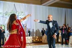 Upbeat Indian couple's dance performance. Upbeat Indian couple's dance performance.