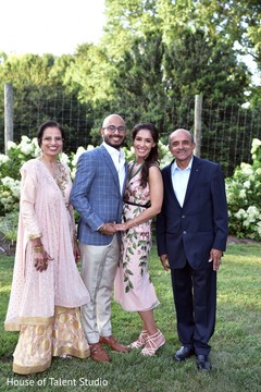 Marvelous photo of Indian couple with parents capture. Marvelous photo of Indian couple with parents capture.