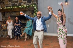 Indian couple celebrating at their pre-wedding party. Indian couple celebrating at their pre-wedding party.