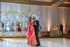 Indian groom dancing with his mother capture Indian groom dancing with his mother capture
