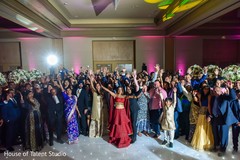 Vibrant indian couple with guests at reception party capture. Vibrant indian couple with guests at reception party capture.