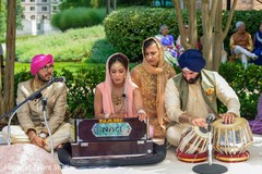 Indian bride playing the ceremony NAGI Harmonium. Indian bride playing the ceremony NAGI Harmonium.