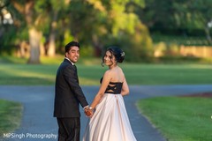 Indian bride and groom holding hands. Indian bride and groom holding hands.