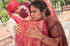 Tender moment, Indian bride receiving a great hug. Tender moment, Indian bride receiving a great hug.
