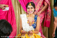 Joyful indian bride's pre-wedding ritual. Joyful indian bride's pre-wedding ritual.