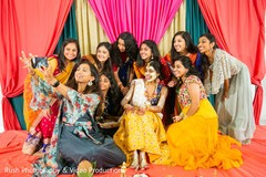Indian bride is smeared in yellow turmeric paste. Indian bride is smeared in yellow turmeric paste.