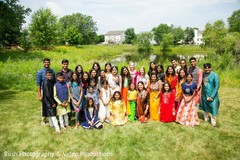 Family, bride and bridesmaids posing outdoors of haldi. Family, bride and bridesmaids posing outdoors of haldi.