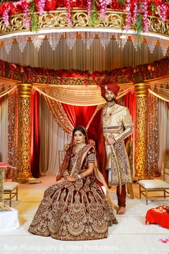 Stunning capture of indian couple posing at mandap. Stunning capture of indian couple posing at mandap.