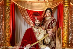 Glamorous indian couple posing at mandap. Glamorous indian couple posing at mandap.