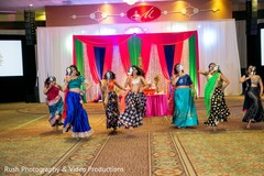 Indian bridesmaids performing a sangeet dance. Indian bridesmaids performing a sangeet dance.