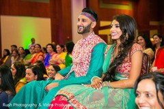 Indian couple celebrating the sangeet traditional ceremony. Indian couple celebrating the sangeet traditional ceremony.