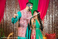 Joyful indian couple with dandiya raas sticks. Joyful indian couple with dandiya raas sticks.