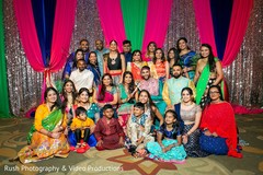 Incredible photography of Indian couple with sangeet guests. Incredible photography of Indian couple with sangeet guests.