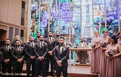 Everyone looking at the bride as she enters the church. Everyone looking at the bride as she enters the church.