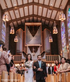 Beautiful Maharani walking down the aisle with her father. Beautiful Maharani walking down the aisle with her father.
