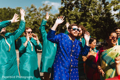Indian groom with groomsmen during baraat Indian groom with groomsmen during baraat