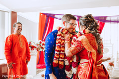 Indian bride and groom exchanging garlands ceremony. Indian bride and groom exchanging garlands ceremony.