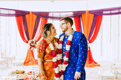 See this Indian couple on their traditional wedding outfits. See this Indian couple on their traditional wedding outfits.