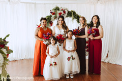 Heartwarming Indian bride with bridesmaids and flowergirls photo. Heartwarming Indian bride with bridesmaids and flowergirls photo.