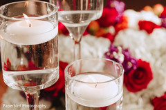 Elegant Indian wedding reception candles decor. Elegant Indian wedding reception candles decor.