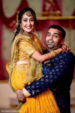 Joyful Indian couple at photo shoot. Joyful Indian couple at photo shoot.