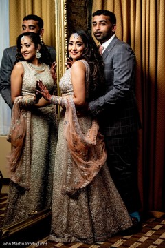 Dazzling Indian couple in front of the mirror. Dazzling Indian couple in front of the mirror.