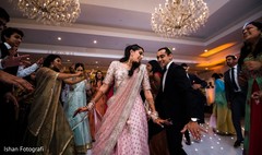 Joyful Indian bride and groom dancing capture Joyful Indian bride and groom dancing capture