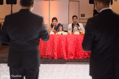 Indian bride and groom reacting to speeches. Indian bride and groom reacting to speeches.