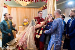 Funny moment, maharani trying to put garland on groom. Funny moment, maharani trying to put garland on groom.