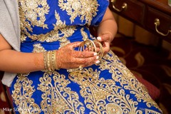 Indian bride putting on her bangles. Indian bride putting on her bangles.