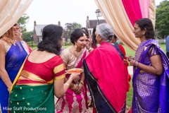 Indian bride being blessed by relative. Indian bride being blessed by relative.
