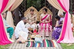 Lovely Indian couple at their wedding rituals. Lovely Indian couple at their wedding rituals.