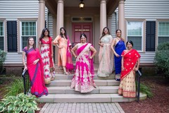 Adorable indian bride posing with bridesmaids. Adorable indian bride posing with bridesmaids.