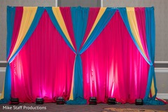 Creative Indian wedding stage draping and lights decoration. Creative Indian wedding stage draping and lights decoration.