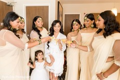 Indian bridesmaids and bride having a toast. Indian bridesmaids and bride having a toast.