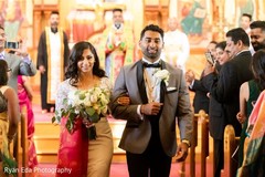 Joyful India couple walking down the aisle. Joyful India couple walking down the aisle.