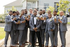 Elegant Indian groom posing with groomsmen for photo shoot. Elegant Indian groom posing with groomsmen for photo shoot.