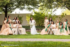 Sweet Indian bride and bridesmaids posing for photo shoot. Sweet Indian bride and bridesmaids posing for photo shoot.