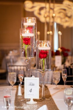 Elegant indian wedding table roses decor. Elegant indian wedding table roses decor.