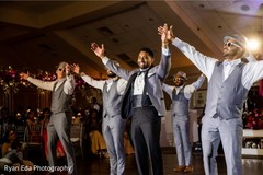 Indian groom and groomsmen during reception dance. Indian groom and groomsmen during reception dance.