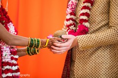 Indian couple holding the coconut ritual. Indian couple holding the coconut ritual.