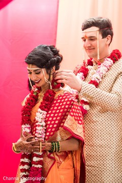 Tying of the Mangalsutra ritual. Tying of the Mangalsutra ritual.