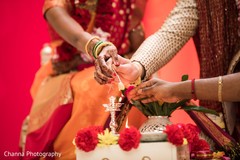 Indian couple making offerings at sacred fire. Indian couple making offerings at sacred fire.