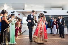 Indian bride and groom's entrance to wedding reception. Indian bride and groom's entrance to wedding reception.