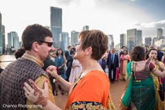 Gleeful indian wedding reception dance. Gleeful indian wedding reception dance.