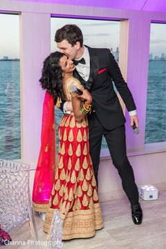 Lovely capture Indian groom hugging bride. Lovely capture Indian groom hugging bride.